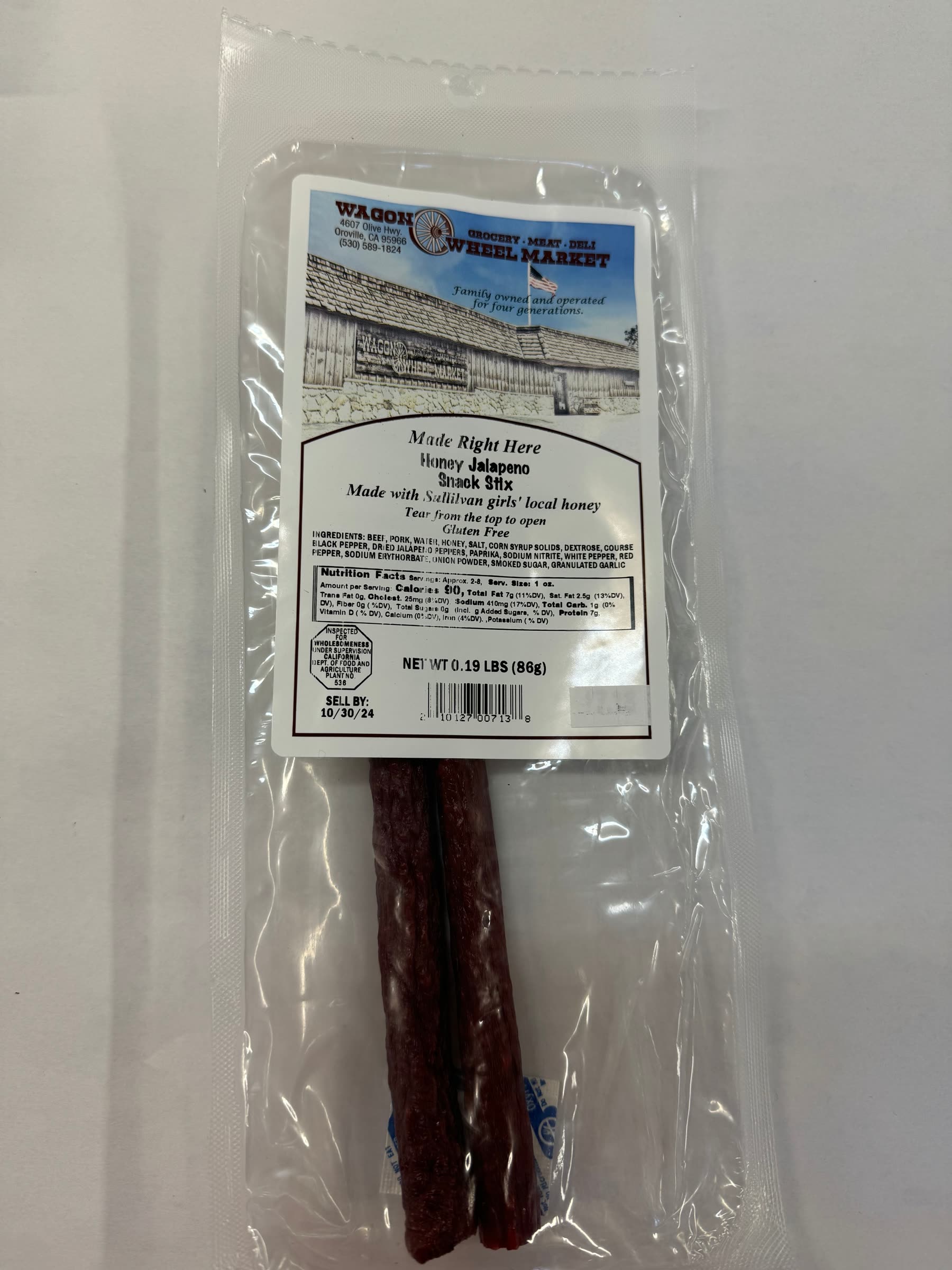 A packet of Honey Jalapeno Snack Stix with the Wagon Wheel Market label